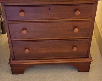 One of a pair of bedside chests