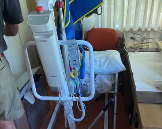 This is a machine designed to help life and elderly or handicapped person out of bed