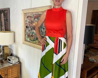 The painting behind Wendy has sold - but we have 5 racks of great clothes -loads of vintage!