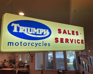 Original vintage Triumph Motorcycles Sales Service lighted sign. 13” x 3’- back 
