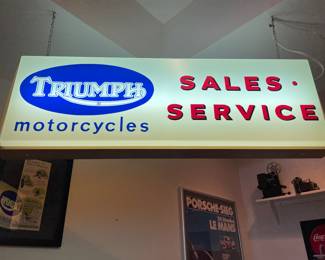 Original vintage Triumph Motorcycles Sales Service lighted sign. 13” x 3’ - front