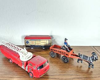 Lot #151 -“Vintage Toy Lot –Cast Iron Goat Cart Express Wagon, Tin Litho Colorado & Southern Train Car, Red Avon Fire Truck