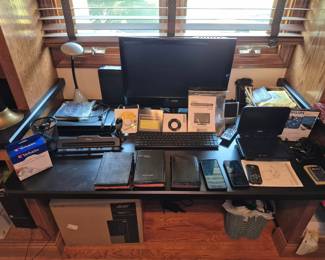 Computer, vintage Bibles, DVD player.