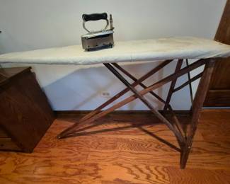 Antique ironing board and iron.