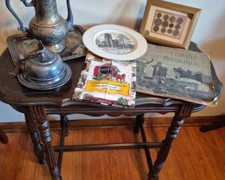 There is a beautiful table under all that cool stuff!