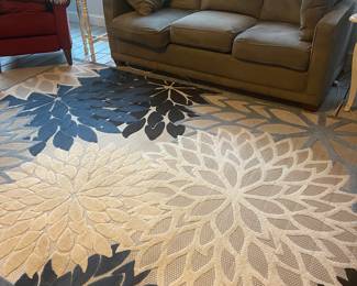 Large rug and two round rugs