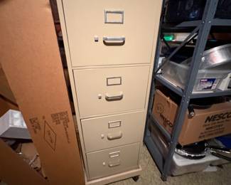 . . . 4-drawer file cabinet