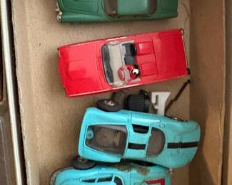 . . . four Aurora HO slot cars