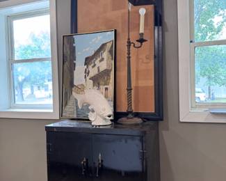 Antique metal cabinet safe /dry bar- antique lamp, French painting, cork board.