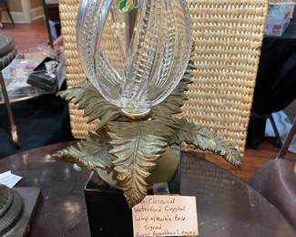 Closeup of Crystal. You can see the sticker but the classic Waterford mark is straight down near the leaves.