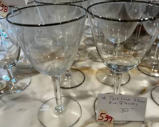 #539	12 port wine silver rimmed glasses	 $30.00 			
