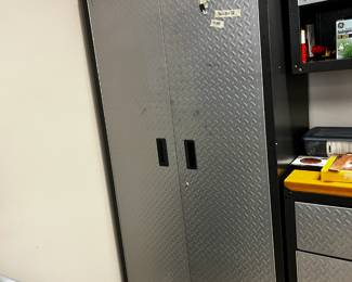#422 Gladiator Cabinet 36x18x72. Has key 3 shelves $245.00