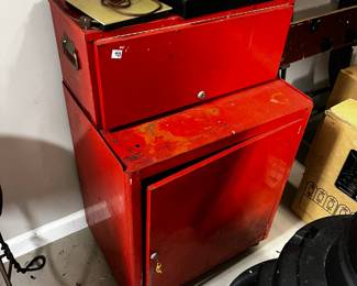 #430	Red metal cabinet w 1 door, key and flip up door 21x15x33	 $40.00 			
