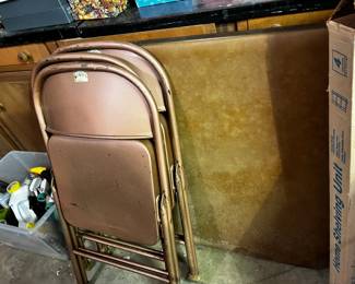 #466	folding table and 4 chairs	 $25.00 			
