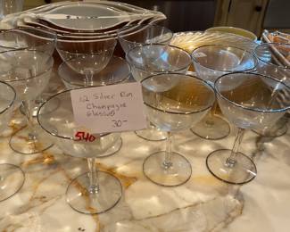 #540	12 champagne silver rimmed glasses	 $30.00 			
