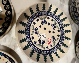 #556	4 piece polish pottery Christmas with bells and trees	 $60.00 			
