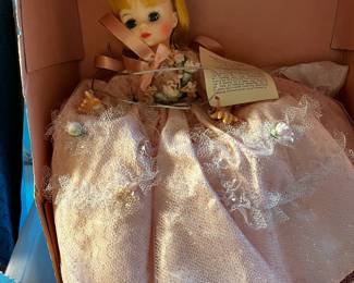 #605	Madame Alexander Cinderella in pink outfit 13" tall in box	 $20.00 			
