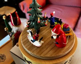 #596	Ergebirgische Volkskunst Stiffen German music box, tree and santa and rocking horse	 $35.00 			

