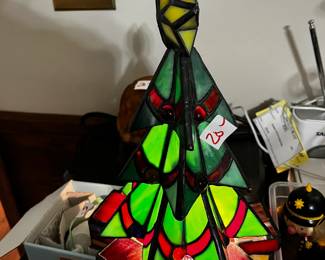 #517	Stained glass tree, lights up 11" tall	 $20.00 			
