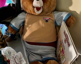 #601	Teddy Ruxpin with book and pajamas	 $30.00 			
