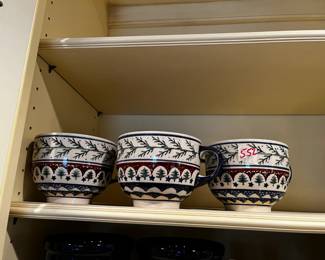 #552	4 polish pottery Christmas soup mugs	 $32.00 			
