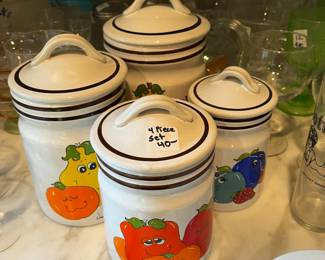 #551	vintage 4 piece fruit canister set	 $40.00 			
