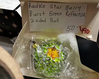 #490	Christopher Radko star berry burst green reflector 2 sided ball	 $50.00 			
