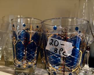 #535	set of 8 blue and gold hi-ball glasses	 $20.00 			
