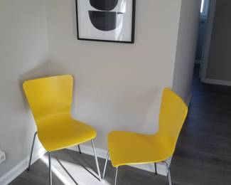 Contemporary yellow chairs. Art.