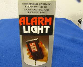 Personal Flashlight PLUS a button for an alarm when someone unwanted enters your space. It warns the intruder and those around, that assistance may be needed and the intruder is not welcome.