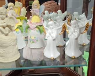 The shelves of bells. This has selection has angel bells. Other shelves have different themes.