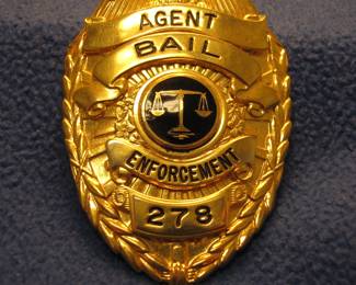 Solid metal badge.