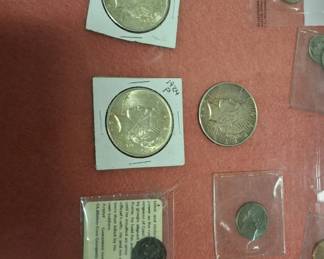 Coin item collection with some B.C. and early A.D. civilizations. This area includes 10 forks, 10 spoons that are sterling silver,