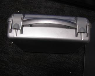 A metal brief- case. Sturdy and deep.