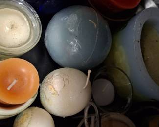 Several types of candles for both size and purpose.