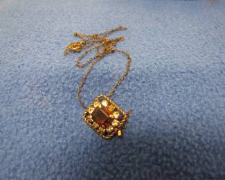 Attractive necklace. Stone unknown.