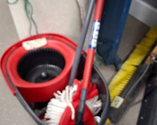 New mop, bucket and pail. Operator not included.