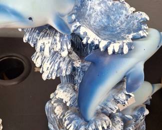 A dolphin small fountain.