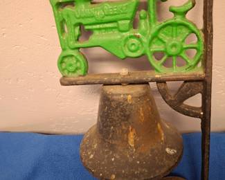 John Deere dinner bell to be hung out-side and rung with enthusiasm to call the hungry "herd" to the table.