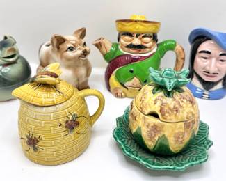6 Vintage Creamers, Honey Jars & Mexican Siesta Man Tea Pot
Lot #: 58