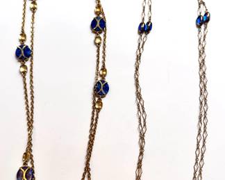 2 Extra Long Gold Tone Necklaces With Blue Beads
Lot #: 72