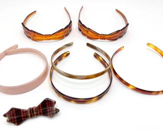 6 Vintage Plastic Headbands & Barrette
Lot #: 143