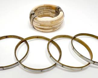 4 Vintage Mother Of Pearl Bangles & Carved Bone Cuff Bracelet
Lot #: 110