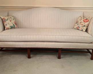 Ivory Upholstered Sofa with Small Floral Pillows