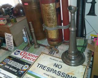 Fire collectibles
Silver trumpet,
Model A fire truck 
extingusher with brass mounting bracket,
Signal corp air horn