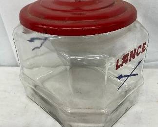 Lance Glass Jar with Red Metal Lid and Crossed Arrows Motif, 7×8 Inches