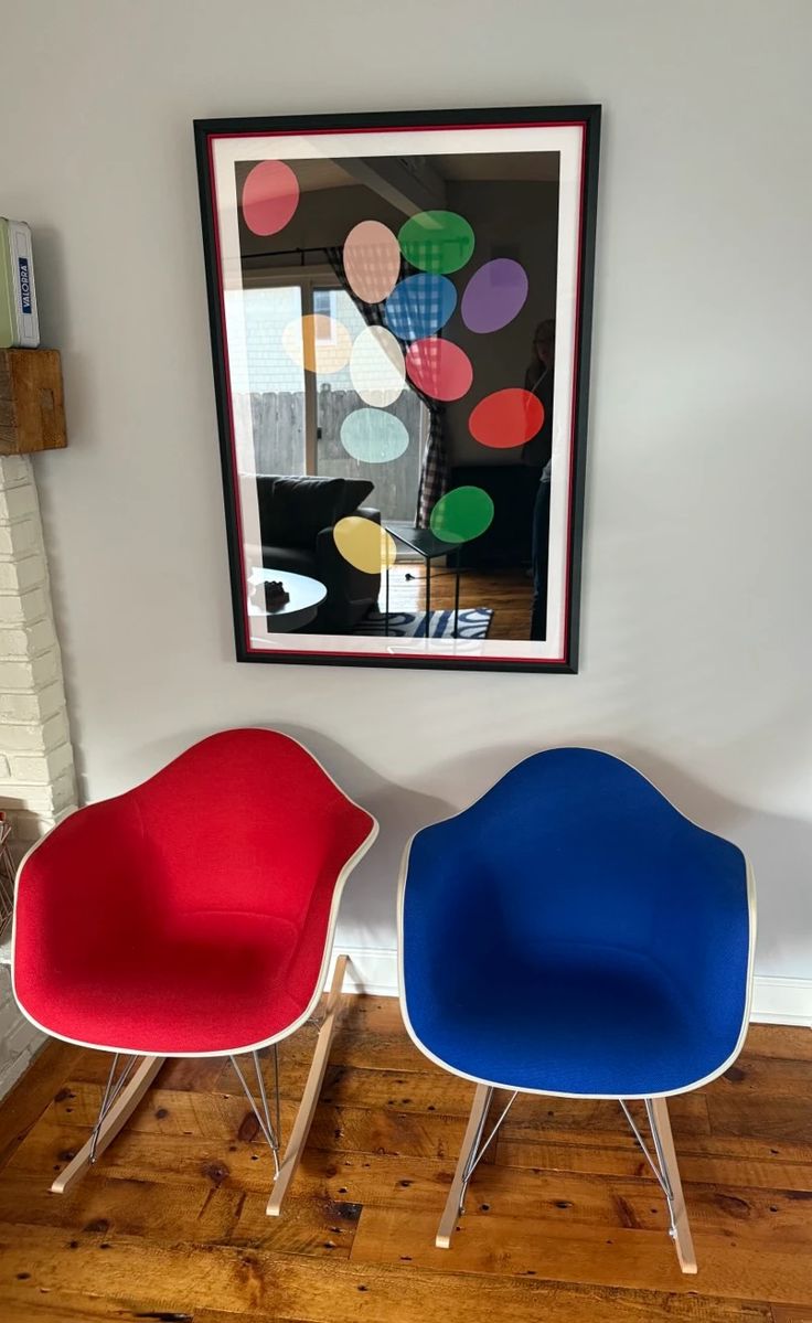 Eames Herman Miller Vitra Upholstered  Molded Plastic with rocker base