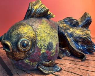 A vintage Chinese wood sculpture of a koi fish