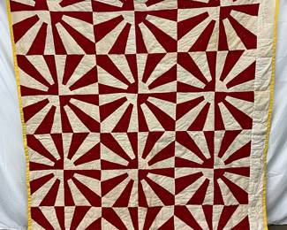 Early Hand-Stitched Quilt with Red and White Starburst Pattern