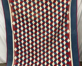 Early Quilt with Tumbling Block Pattern and Blue Border